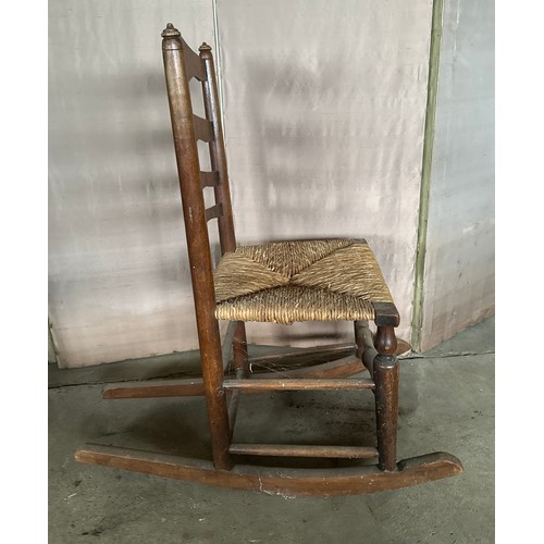 149 - Two 19thC ladder backed chairs including a rocking chair.