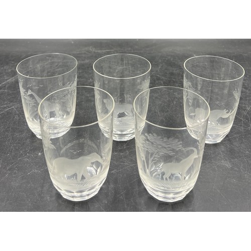 384 - Five Rowland Ward engraved glass tumblers. 10cm h.