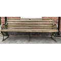A 19thC cast iron and wooden slatted garden bench by Cruckshank and Co. Ld. Denny. 197 l x 82 h x 68... 