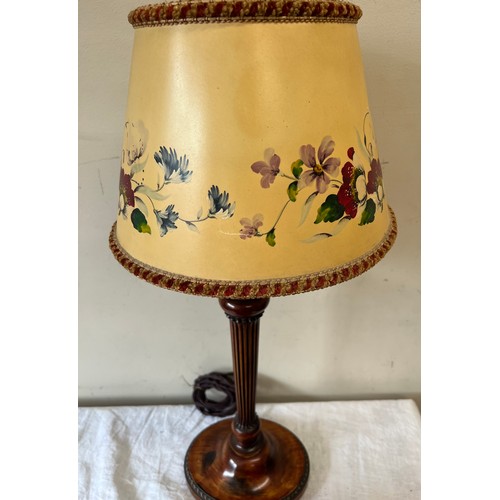 763 - A vintage wooden table lamp with reeded column and a hand painted shade, 59cm h to top of shade, tog... 