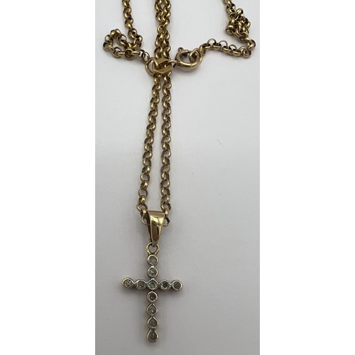 464 - A 9 carat gold chain with diamond set crucifix pendant. Total weight 5.7gm. Crucifix approximately 2... 