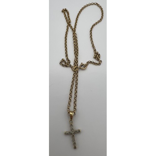 465 - A 9 carat gold chain and crucifix pendant. Total weight 6.7gm. Crucifix 3.5 x 2.2cm. Length of chain... 