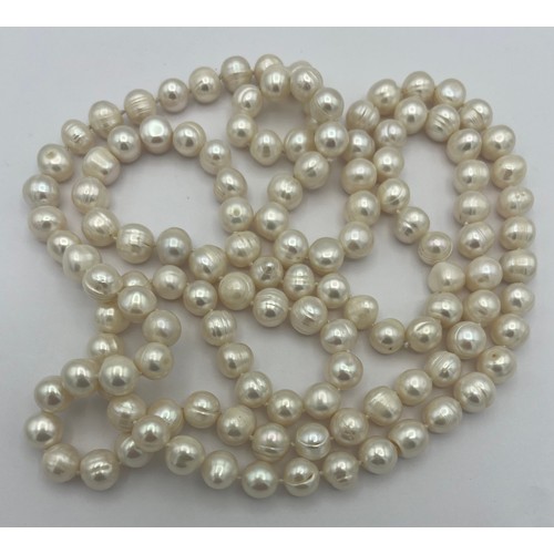 466 - A string of cultured pearls. 122cm l.