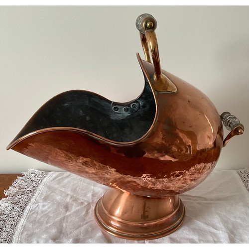 1247 - A 19thC copper coal helmet with glass handles. 50 x 28cm.