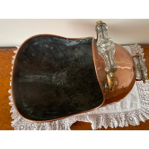 1247 - A 19thC copper coal helmet with glass handles. 50 x 28cm.