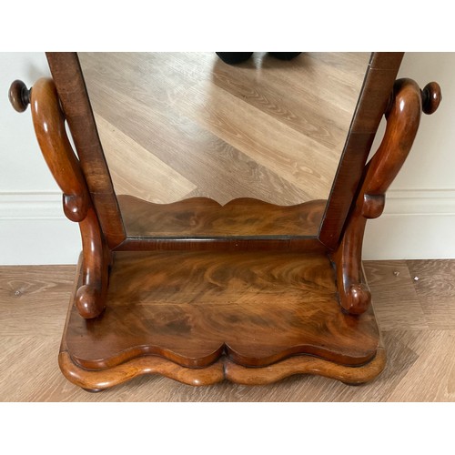 1248 - A 19thC mahogany dressing table mirror with serpentine front. 63 h x 50 w.