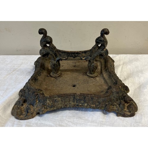 1249 - A Victorian cast iron foot scraper. 30 x 30 x 17cm h.