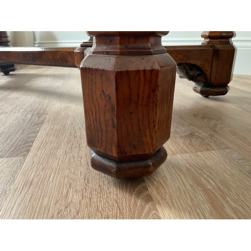 156 - A 19thC burr elm library table of exceptional quality with whale and harpoon carving and concealed c... 