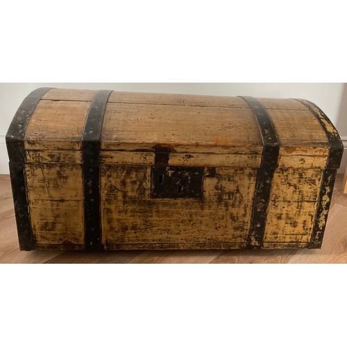 157 - A 19thC pine and metal domed topped trunk with carrying handles. 78 l x 44 w x 40 h.