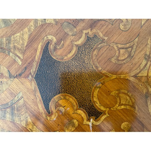 158 - A 19thC French marquetry inlaid centre table with ormolu mounts and drawer to one side. Inlaid with ... 