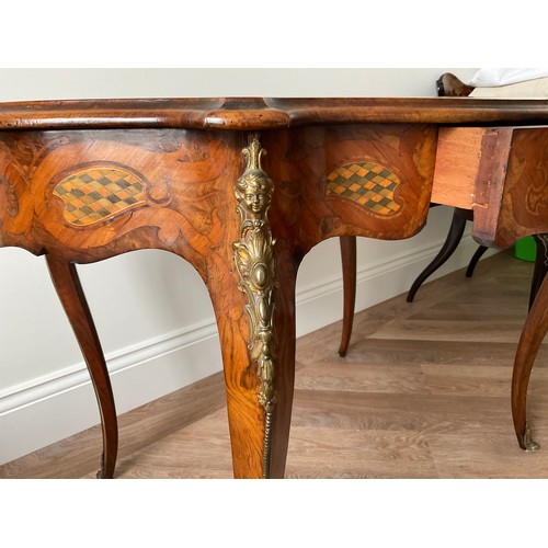 158 - A 19thC French marquetry inlaid centre table with ormolu mounts and drawer to one side. Inlaid with ... 