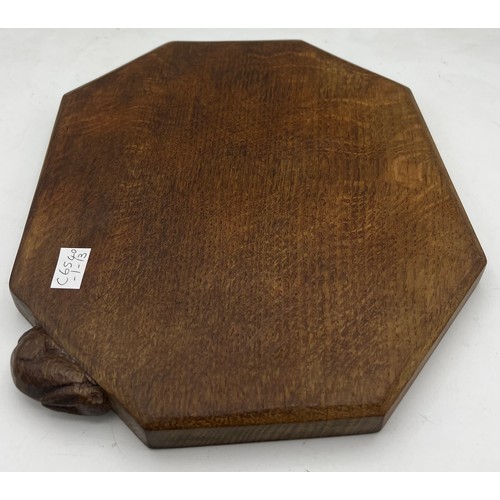 183 - An oak Peter Rabbitman Heap bread board. 31 x 25cm.