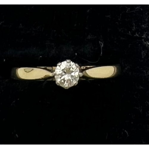 470 - A solitaire diamond ring set in 18 carat yellow gold. Size L. Weight 2.2gm.