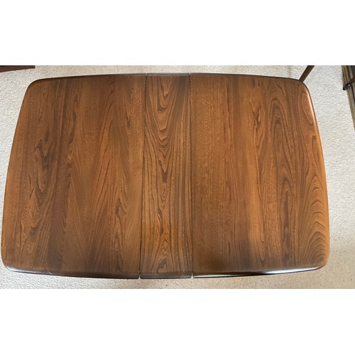 160 - An Ercol drop leaf occasional table. 102 l x 69 w x 45cm h. 16cm w closed.