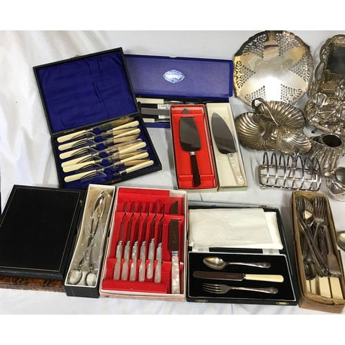 781 - A large collection of silverplate and pewter items to include trays, teapots, jugs, knives, forks an... 