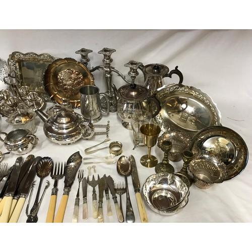 781 - A large collection of silverplate and pewter items to include trays, teapots, jugs, knives, forks an... 