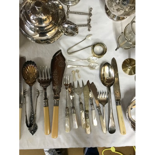 781 - A large collection of silverplate and pewter items to include trays, teapots, jugs, knives, forks an... 