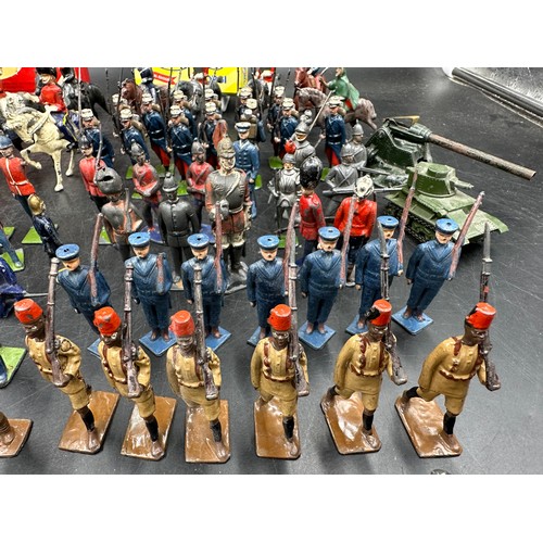 931 - Collection of early lead painted toy soldiers etc vast majority by Britains together with Dinky tank... 