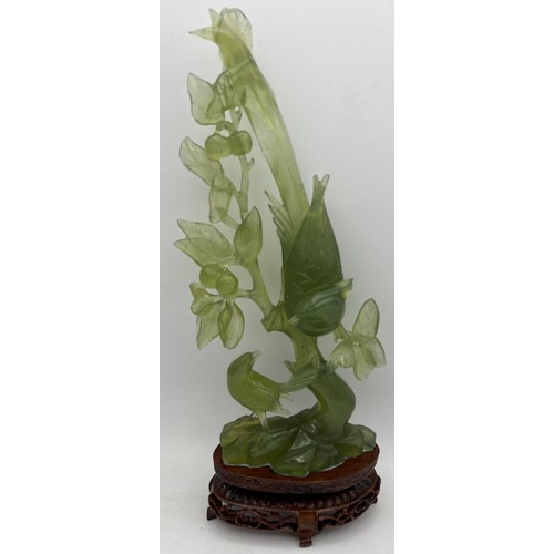 888 - Jade figure of two birds on carved wooden stand in original fitted box. 27cm h.