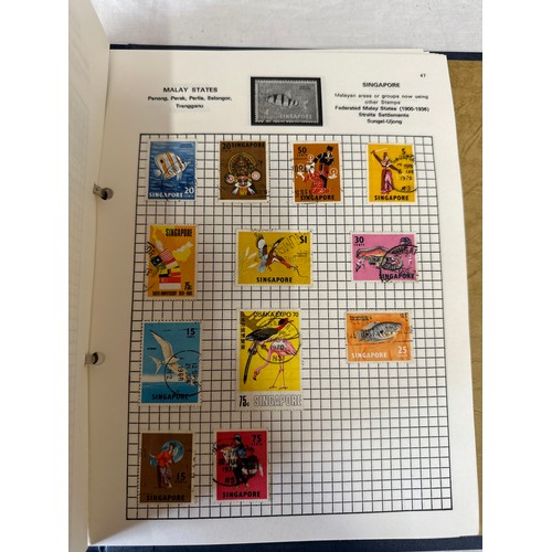 687 - 2 stamp albums, mainly used world stamps together with GB collectors packs. 1975 x2 1982 x1, a few p... 