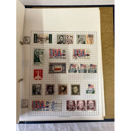 687 - 2 stamp albums, mainly used world stamps together with GB collectors packs. 1975 x2 1982 x1, a few p... 