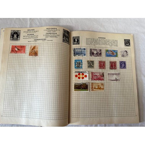 687 - 2 stamp albums, mainly used world stamps together with GB collectors packs. 1975 x2 1982 x1, a few p... 