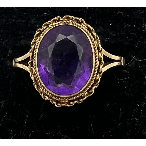 474 - A 9 carat gold ring set with amethyst. Size L. Weight 2.9gm.