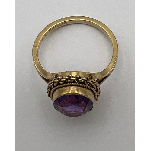 474 - A 9 carat gold ring set with amethyst. Size L. Weight 2.9gm.