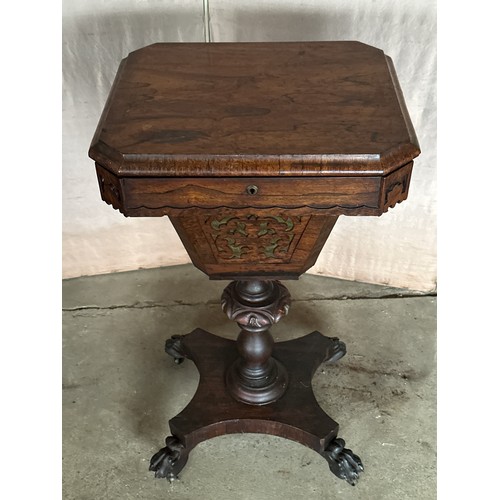 164 - A 19thC rosewood sewing table with fitted interior on lion’s paw feet and castors. 44cm w x 37 d x 7... 