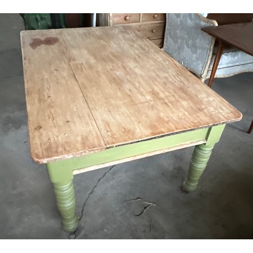 171 - A pine kitchen table with drawer to one end on brass castors. 153.5cm l x 96.5 w x 73 h.