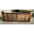 An oak balcony rail. 235cm l x 34 d x77 h.