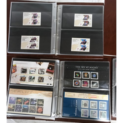 691 - Four Royal Mail presentation pack albums with sleeves comprising of commemorative packs 2005-2008, O... 