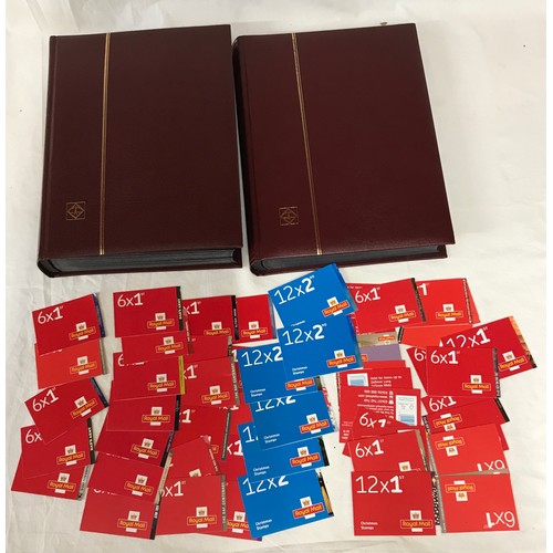 692 - Booklets in two stock books plus loose mainly Machins. Face value £1200 plus.