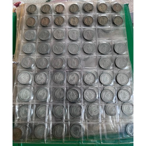 696 - A large folder collection of coins to include Sixpences, threepences, One Shillings, One Florins, Tw... 