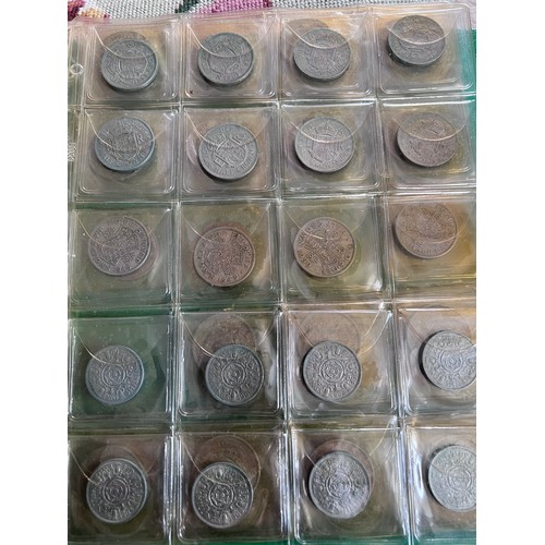 696 - A large folder collection of coins to include Sixpences, threepences, One Shillings, One Florins, Tw... 