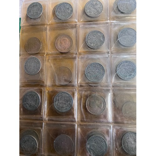 696 - A large folder collection of coins to include Sixpences, threepences, One Shillings, One Florins, Tw... 