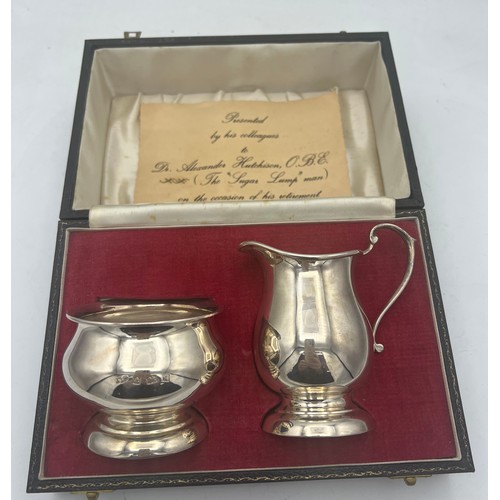 865 - A cased silver milk and sugar bowl Birmingham 1971/72, maker A.T. Cannon Ltd. Total weight 153.6gm.