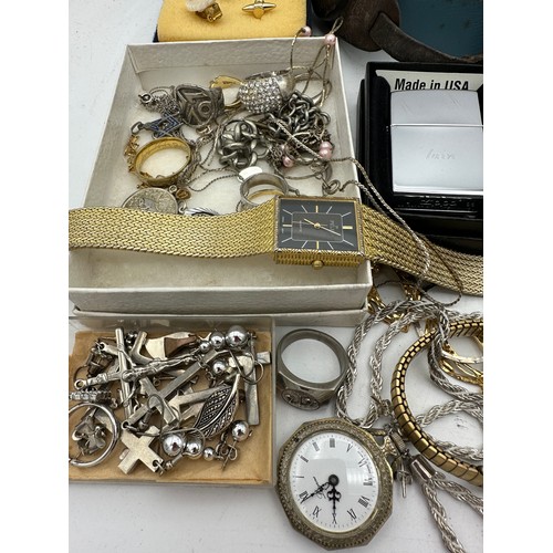 389 - A quantity of vintage costume jewellery to include Zippo lighter, rings, earrings etc.