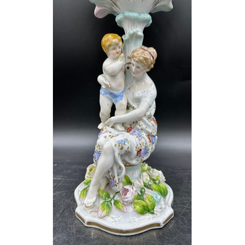 348 - A 19thC continental centrepiece with female and cherub to base and lattice work and floral decorated... 