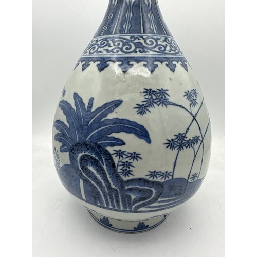 891 - A Chinese blue and white bottle vase, Guangxu mark and period. 29cm h.