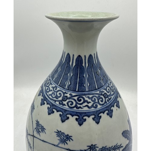 891 - A Chinese blue and white bottle vase, Guangxu mark and period. 29cm h.