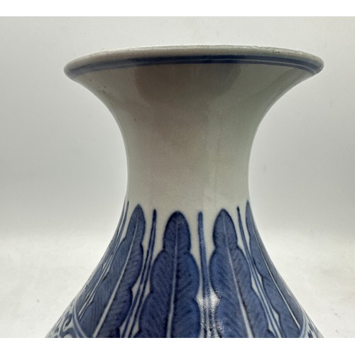 891 - A Chinese blue and white bottle vase, Guangxu mark and period. 29cm h.