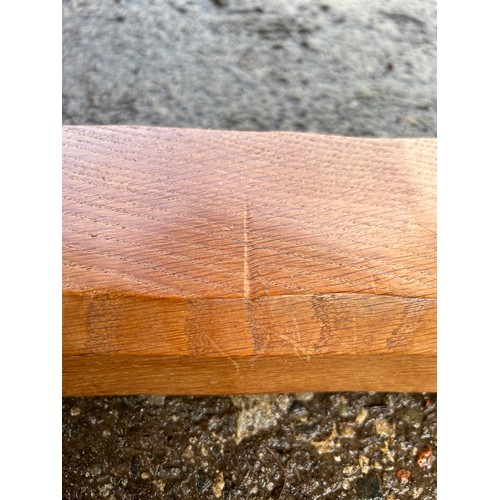 180 - A Robert Thompson Mouseman oak refectory dining table with adzed top. 182cm l x 86cm w x 73cm h.