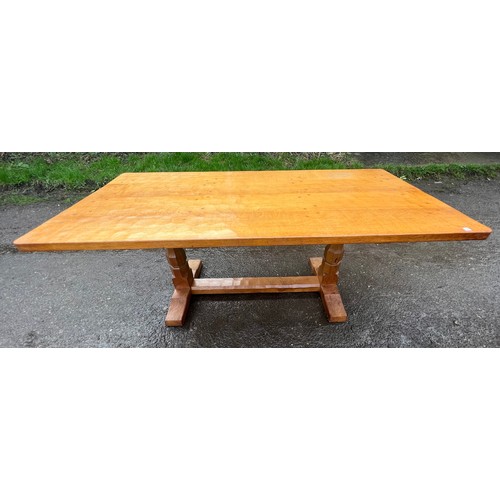 180 - A Robert Thompson Mouseman oak refectory dining table with adzed top. 182cm l x 86cm w x 73cm h.