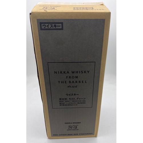 716 - A bottle of Nikka whisky from the Barrel 3000ml celebrating the 80th anniversary on wooden display s... 