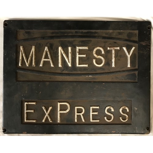 1276A - A cast iron sign reading 'Manesty Express' 32 x 42cm.