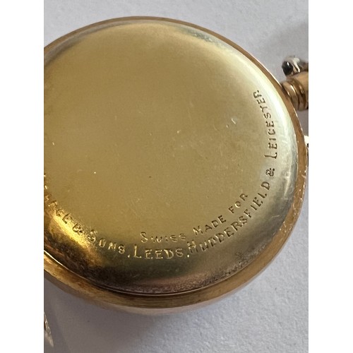 489 - A ladies pocket watch, outer case 18 carat gold, inner case cuivre. Weight 34gm. Case diam: 34mm. Ma... 