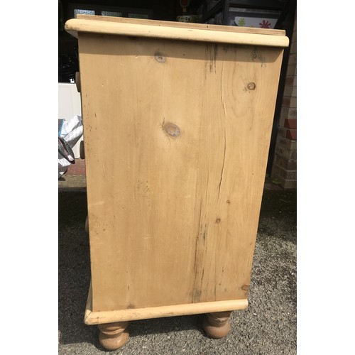 7A - A pine chest of drawers. 91h x 93 l x 47cm d.