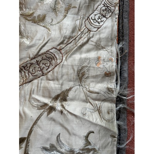 1064 - A large good quality Chinese silk embroidered panel with orange silk lining. Approx. 218 x 308cm.