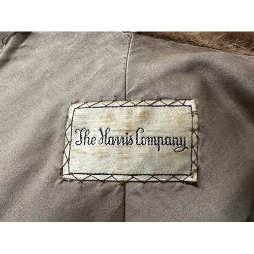 1071 - A vintage mink shawl with pockets. label for the Harris Company.